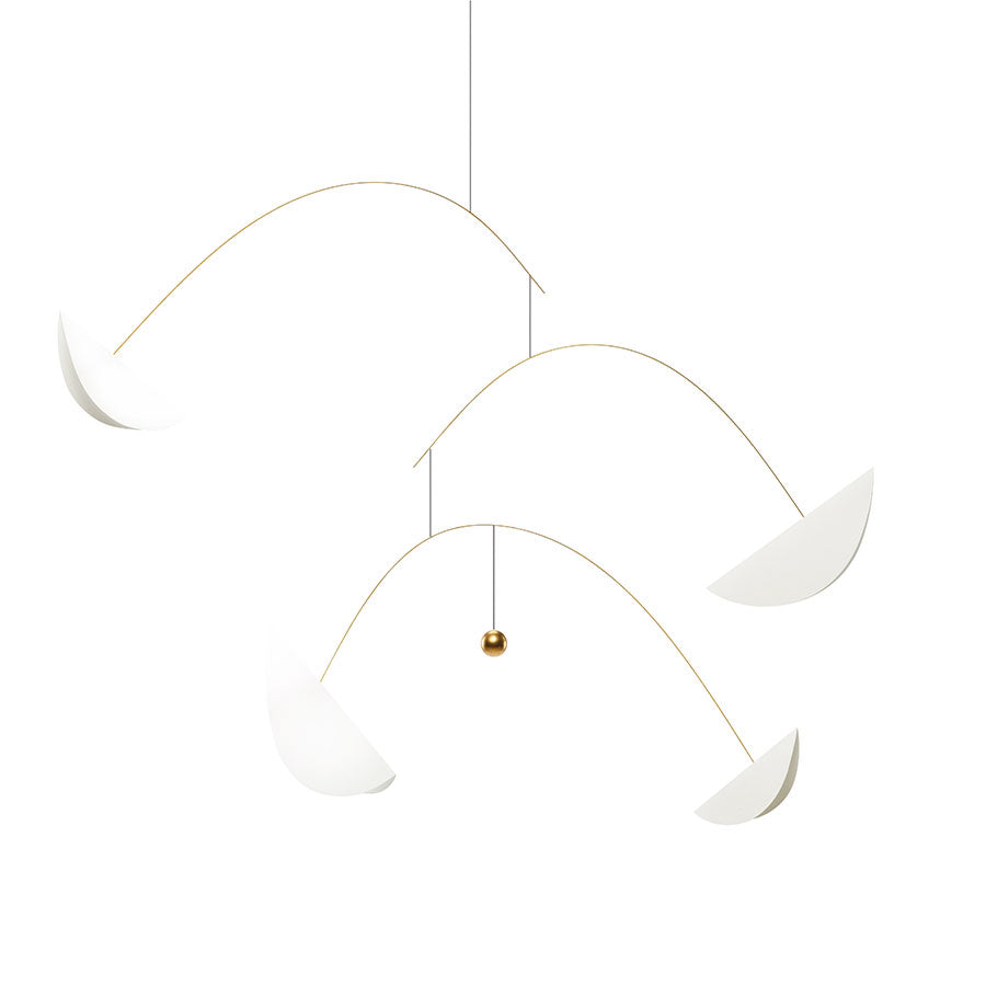 The White Life & Thread Mobile by Flensted features three thin gold rods with white, crescent-shaped elements and a small gold ball at the center, beautifully displayed against a plain white background.