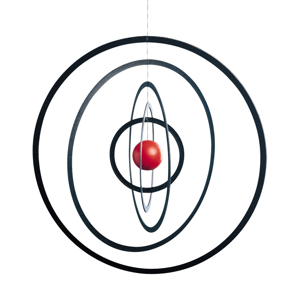 The Science Fiction Mobile by Flensted features concentric black rings of different sizes encircling a central red sphere, suspended by a thin wire—an iconic piece that adds classic and sci-fi-inspired style to your decor.