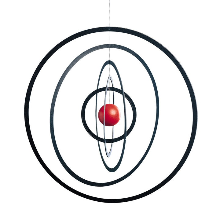 The Science Fiction Mobile by Flensted features concentric black rings of different sizes encircling a central red sphere, suspended by a thin wire—an iconic piece that adds classic and sci-fi-inspired style to your decor.