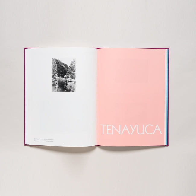 An open book, "Josef Albers in Mexico," shows a black-and-white photo of two people viewing pre-Columbian architecture on the left and the word TENAYUCA in white text on a solid pink background on the right page.