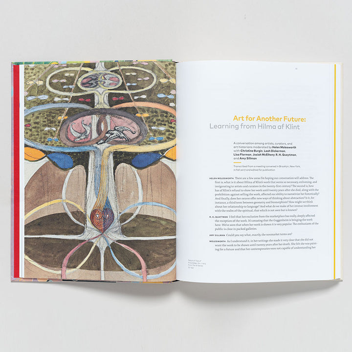 An open book displays an abstract painting inspired by Hilma af Klint on the left; the right page features "Hilma af Klint: Paintings for the Future" in orange font.