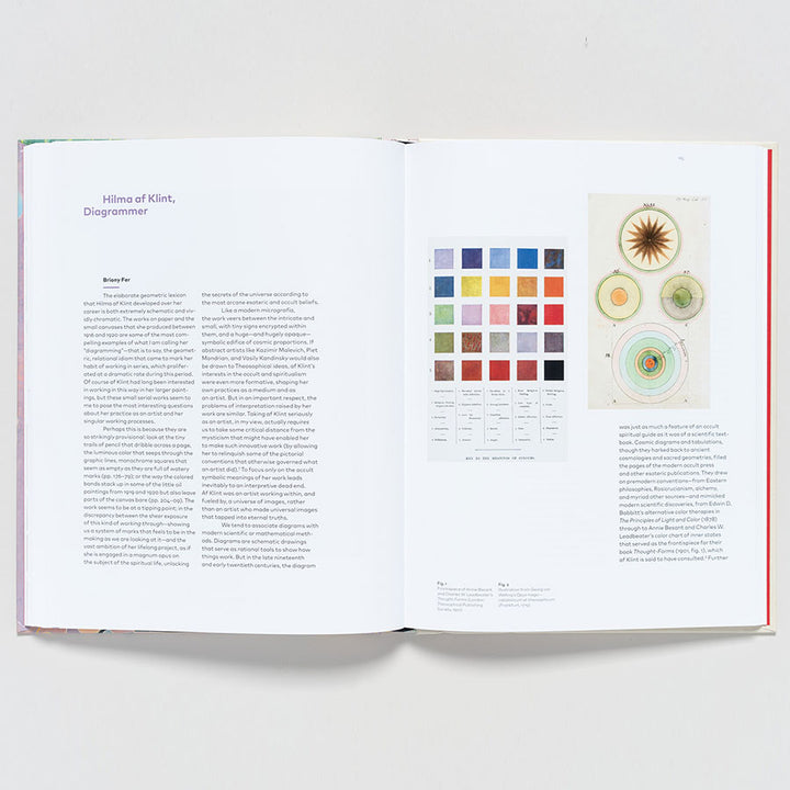 An open copy of "Hilma af Klint: Paintings for the Future" shows text about the artist on the left page and, on the right, diagrams such as a grid of colored squares and abstract circles, highlighting her impact on modernist abstraction.