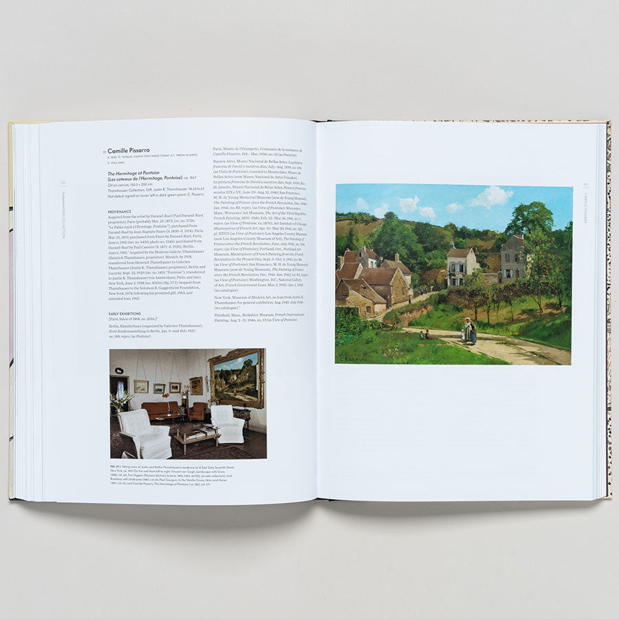 An open book, "Thannhauser Collection: French Modernism at the Guggenheim," shows text and two photos on the left—a furnished room and Thannhauser artwork. The right page features a vibrant modern painting of a village scene.