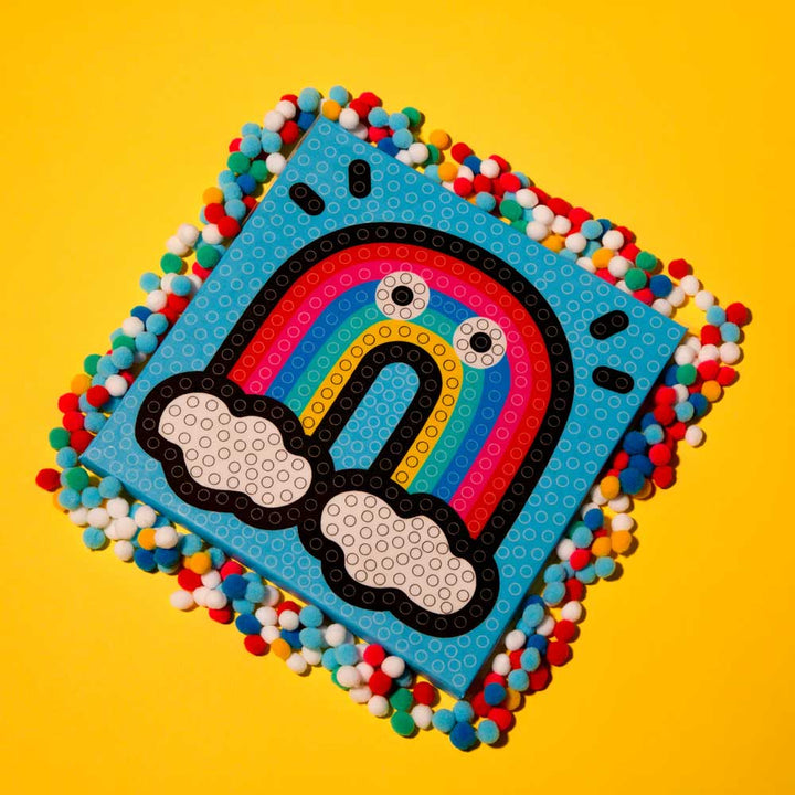 Guggenheim Museum Rainbow Pom Pom Art—colorful, educational activity to build fine motor skills!.