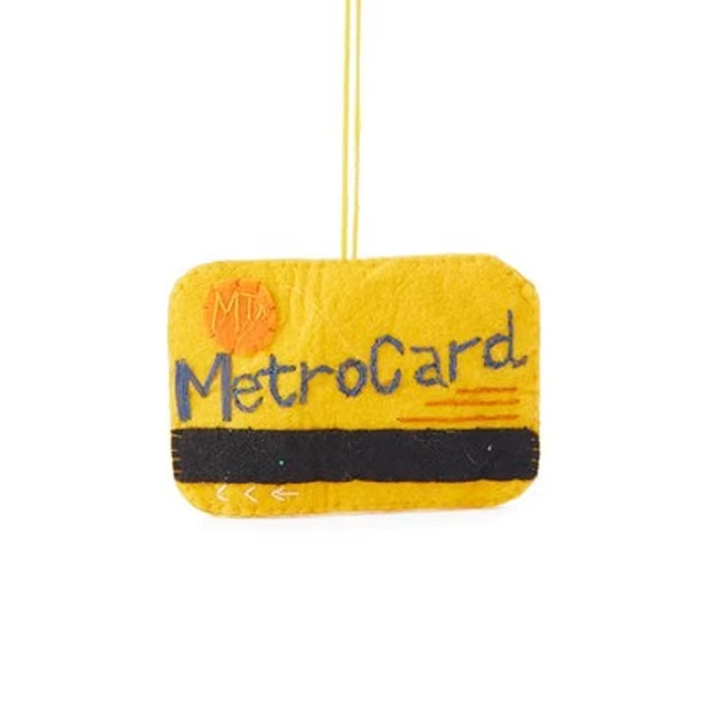 The Guggenheim Museum Metrocard Ornament brings eco-friendly NYC flair to your holiday decor with a festive hanging design.