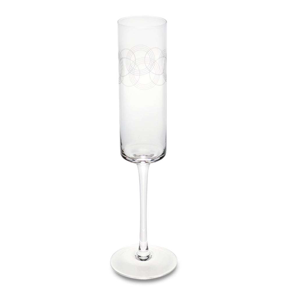 The Guggenheim Gates Champagne Flute, Set of 2, features clear glass and a subtle etched circular pattern on the upper bowl—an elegant choice to enhance any barware collection.