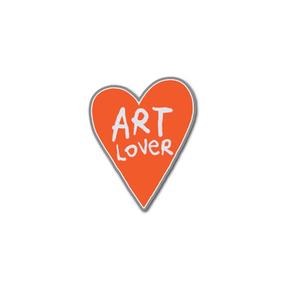 The Art Lover Magnet is a red, heart-shaped magnet with playful white "ART LOVER" text—ideal for fans of Humberto Cruz or anyone who enjoys colorful accessories.