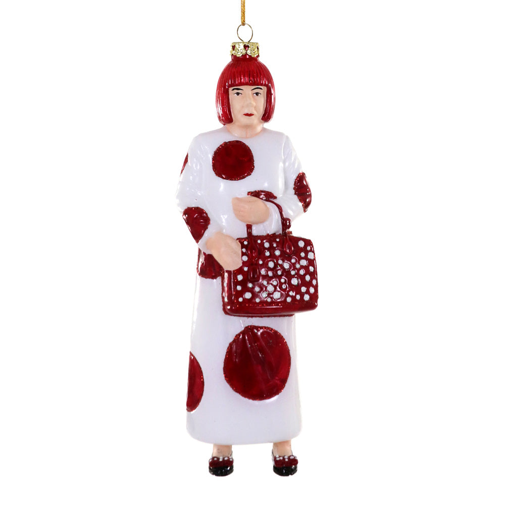 The Kusama Tall Ornament by Guggenheim Museum features red bob hair, a white dress with red dots, and a matching bag.