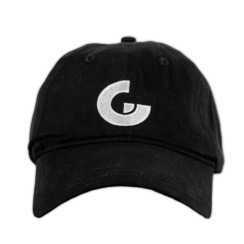 The Guggenheim New York Icon Cap is a black low-profile hat with a large white stylized G embroidered on the front, shown against a plain white background.