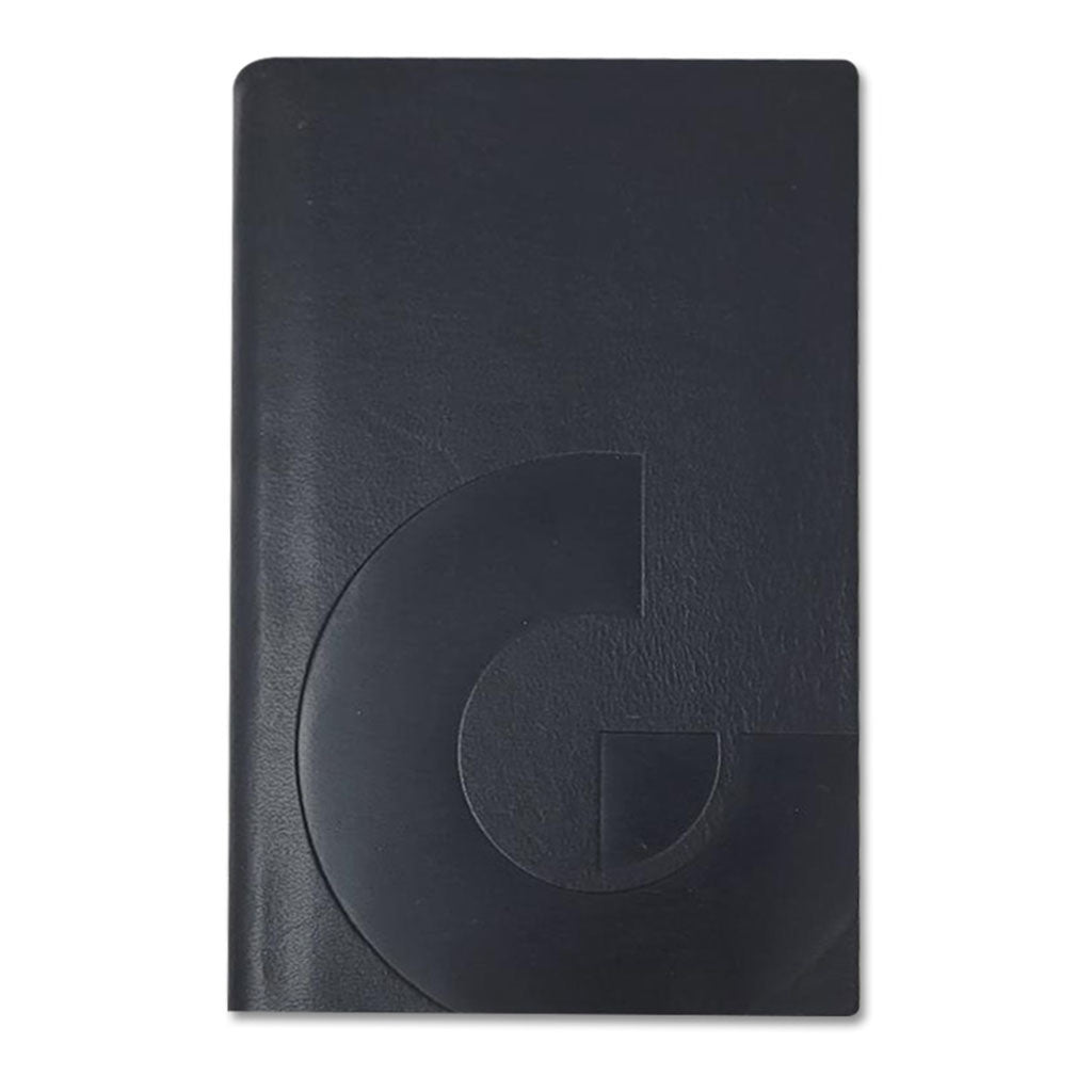 A closed black Guggenheim Leather Notebook featuring a large embossed geometric G on the cover, displayed against a plain white background.