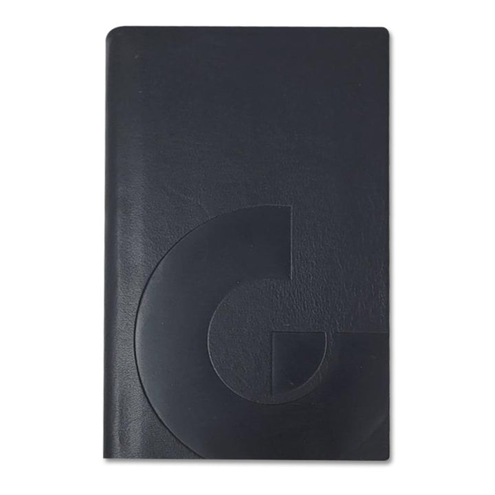 A closed black Guggenheim Leather Notebook featuring a large embossed geometric G on the cover, displayed against a plain white background.