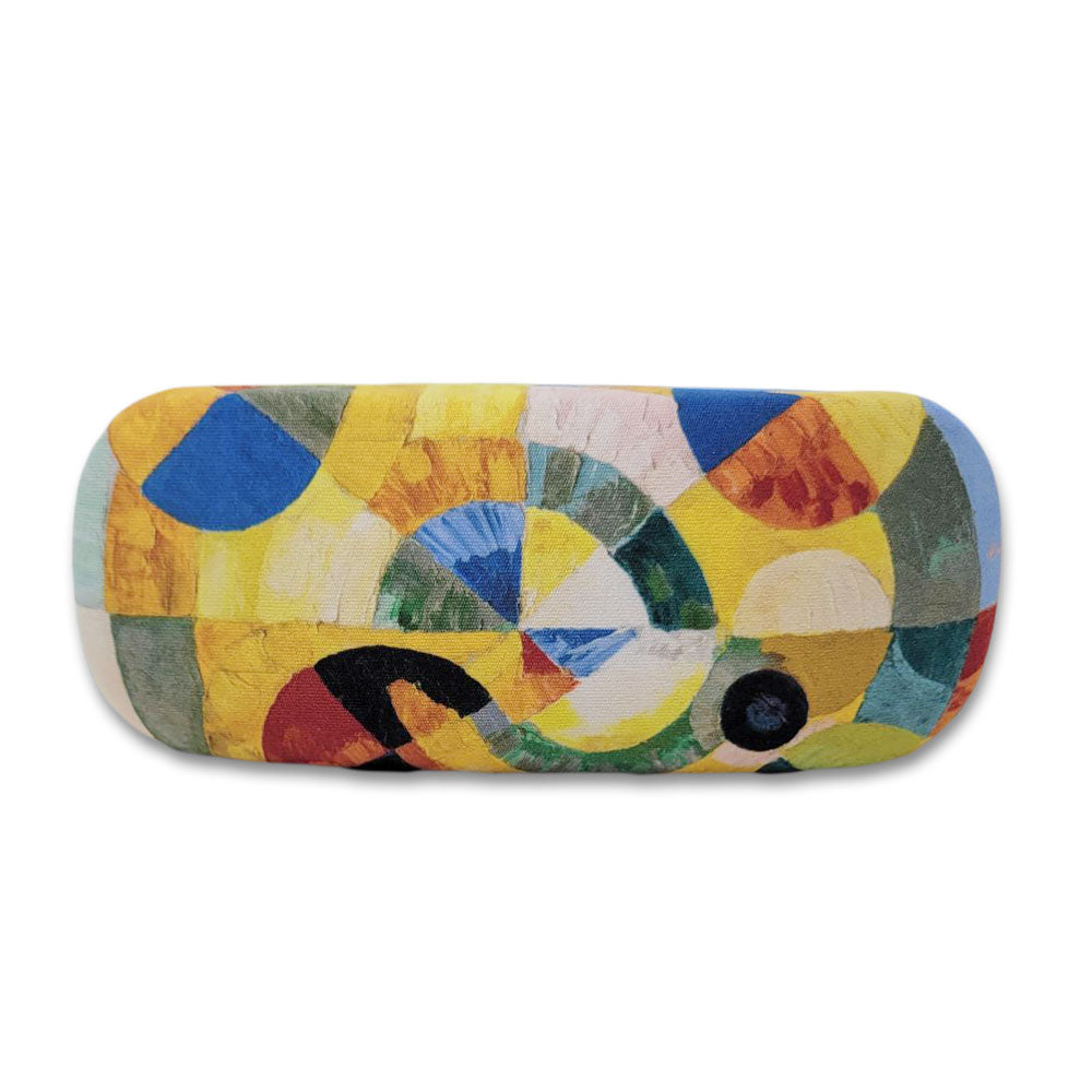 The Delaunay Circular Forms Eyeglass Case features a rectangular shape with an abstract, colorful geometric design in yellow, blue, green, and red on a plain white background, inspired by modern art.