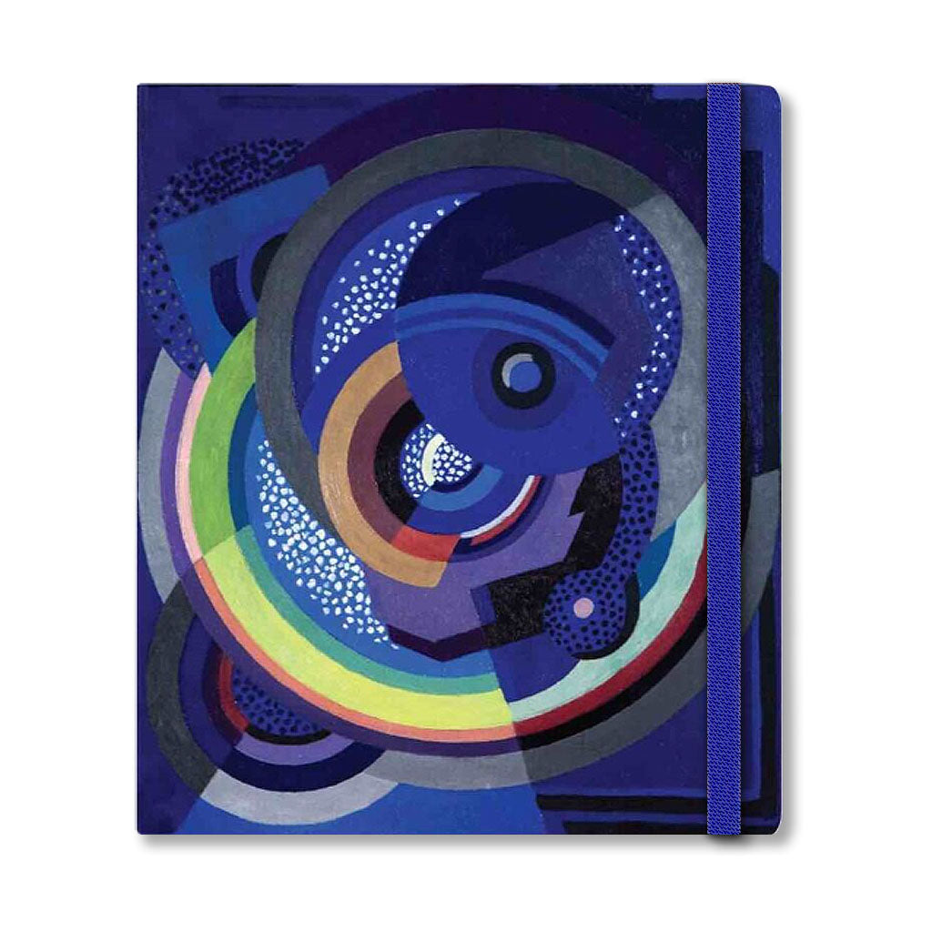 The Jellett, Painting Notebook features a vibrant abstract cover with intersecting circles, arcs, and dots in blue, green, yellow, and red, secured by a blue elastic band on the right side.