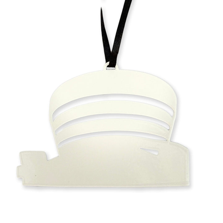 The Guggenheim Ornament is a small white decoration shaped like the museum, with a black hanging ribbon—ideal for wallets or adding flair to a business card display.