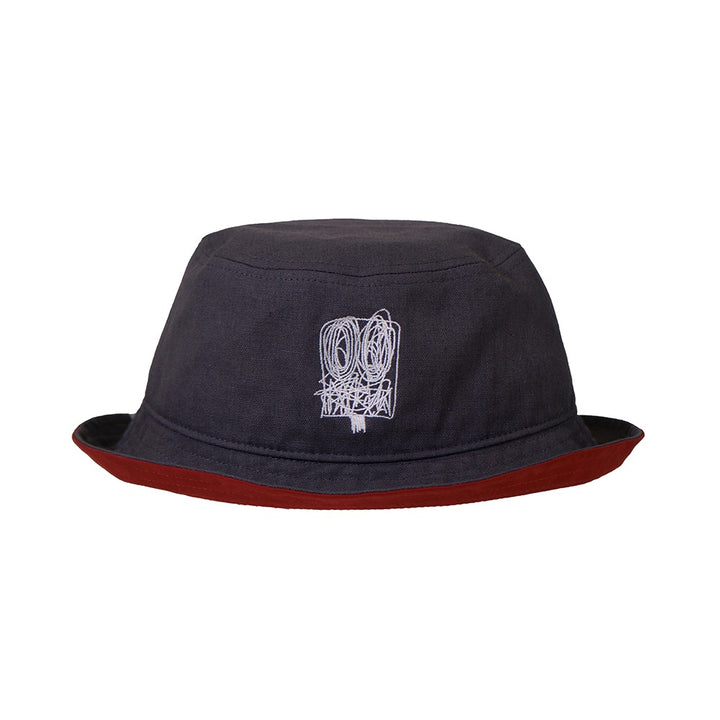 The Rashid Johnson Bucket Cap, Untitled Anxious Men, is a dark gray unisex bucket cap featuring an abstract white line drawing on the front and a maroon brim, inspired by Rashid Johnson’s expressive style.