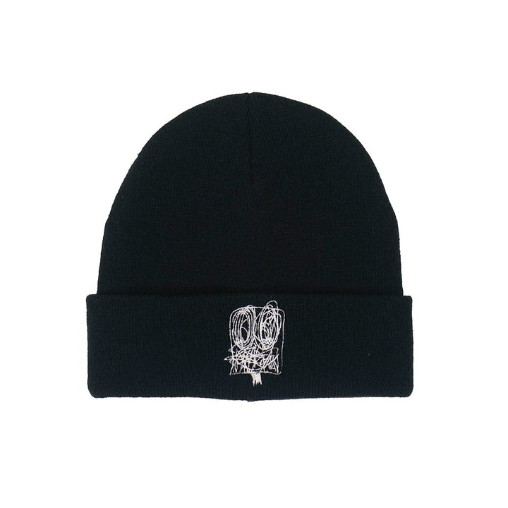 The Rashid Johnson Beanie, Untitled Anxious Men, is a black beanie with a folded brim featuring a white embroidered abstract face from the artist’s Untitled Anxious Men series.