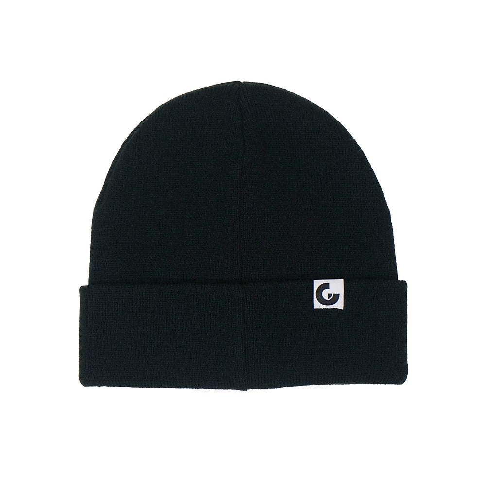 A sleek black beanie with a folded brim, featuring a small white square patch with a stylized G logo—perfect for fans of the Guggenheim’s Rashid Johnson Beanie, Untitled Anxious Men.