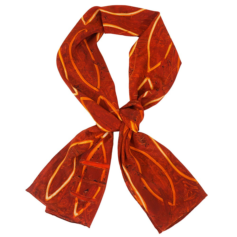 The Rashid Johnson Scarf, God Painting "What's Happenin," features a red silk abstract yellow-orange pattern, tied in a loose knot on white—ideal for art and fashion enthusiasts.