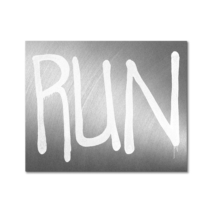 The Rashid Johnson Run Sticker features the word RUN in large, bold, white graffiti-style letters on a metallic silver background. Dimensions: approximately 4 x 2.6 inches.