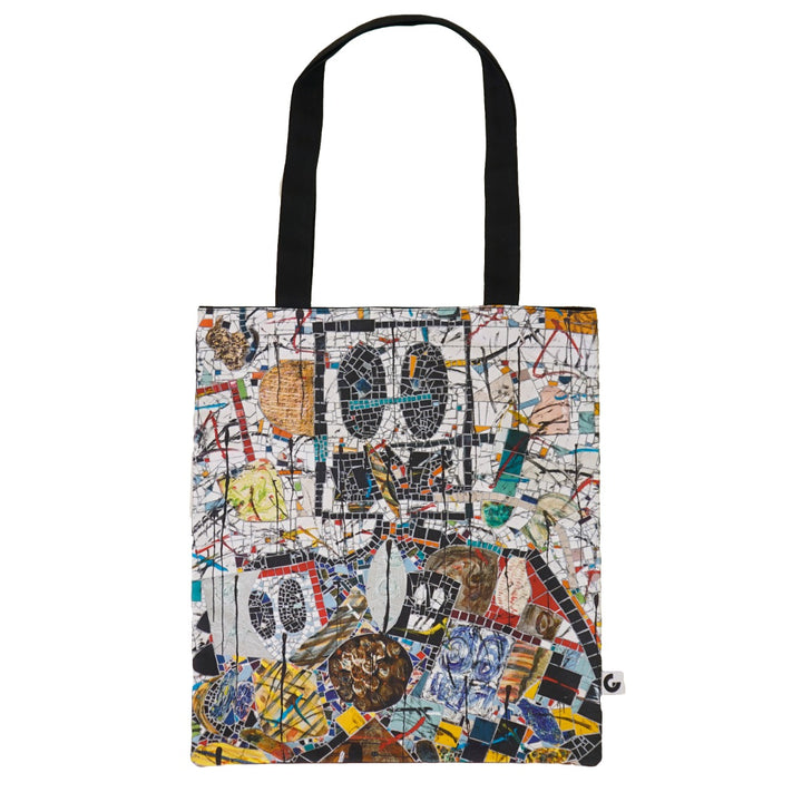 The Rashid Johnson Tote Bag, Broken Man, is a cotton canvas tote with black handles featuring a vibrant abstract mosaic pattern in blue, yellow, white, and black inspired by contemporary art.
