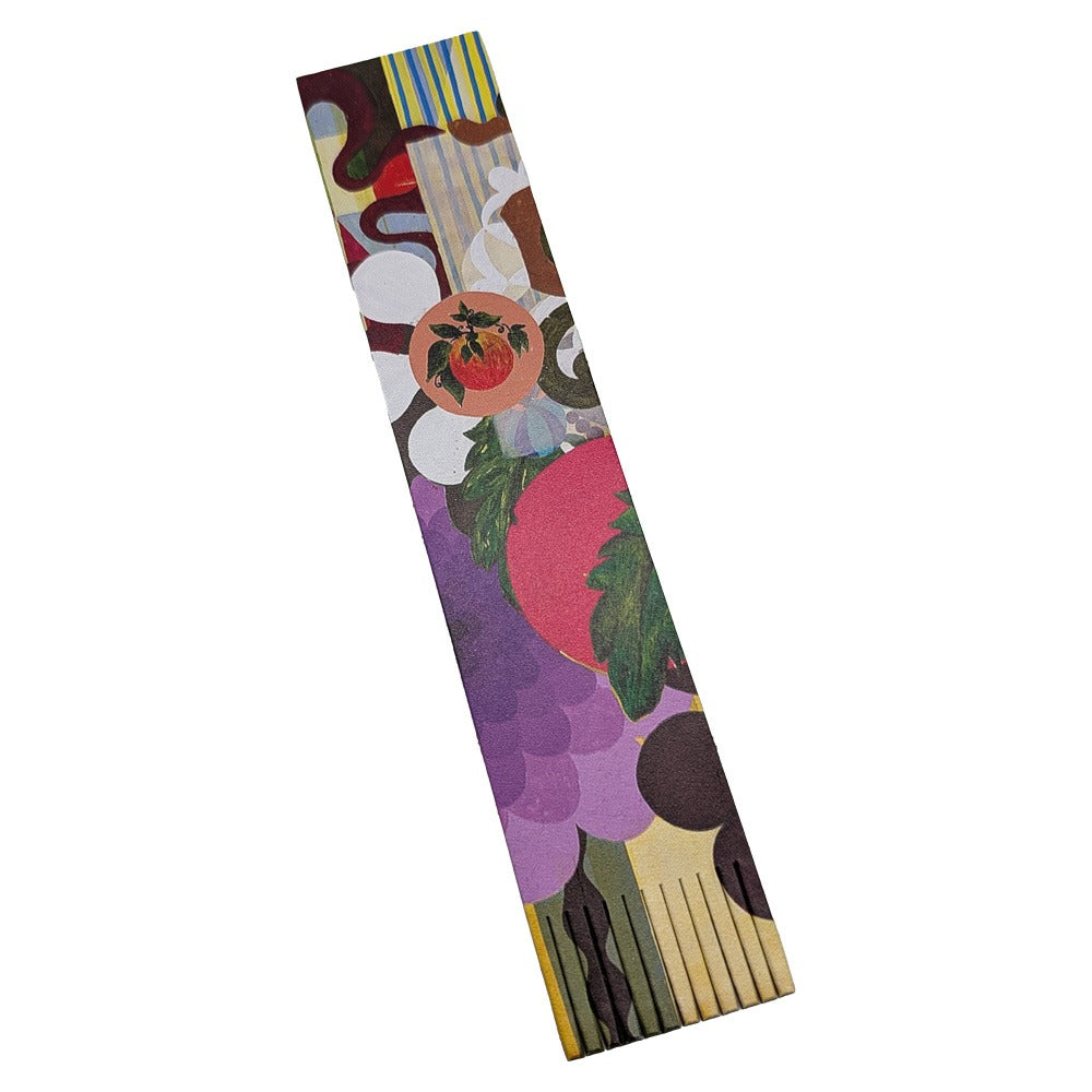 The Guggenheim Beatriz Milhazes Leather Bookmark features a colorful abstract design with grapes, a tomato, leaves, and vibrant shapes in purple, red, green, yellow, and white on a white background.