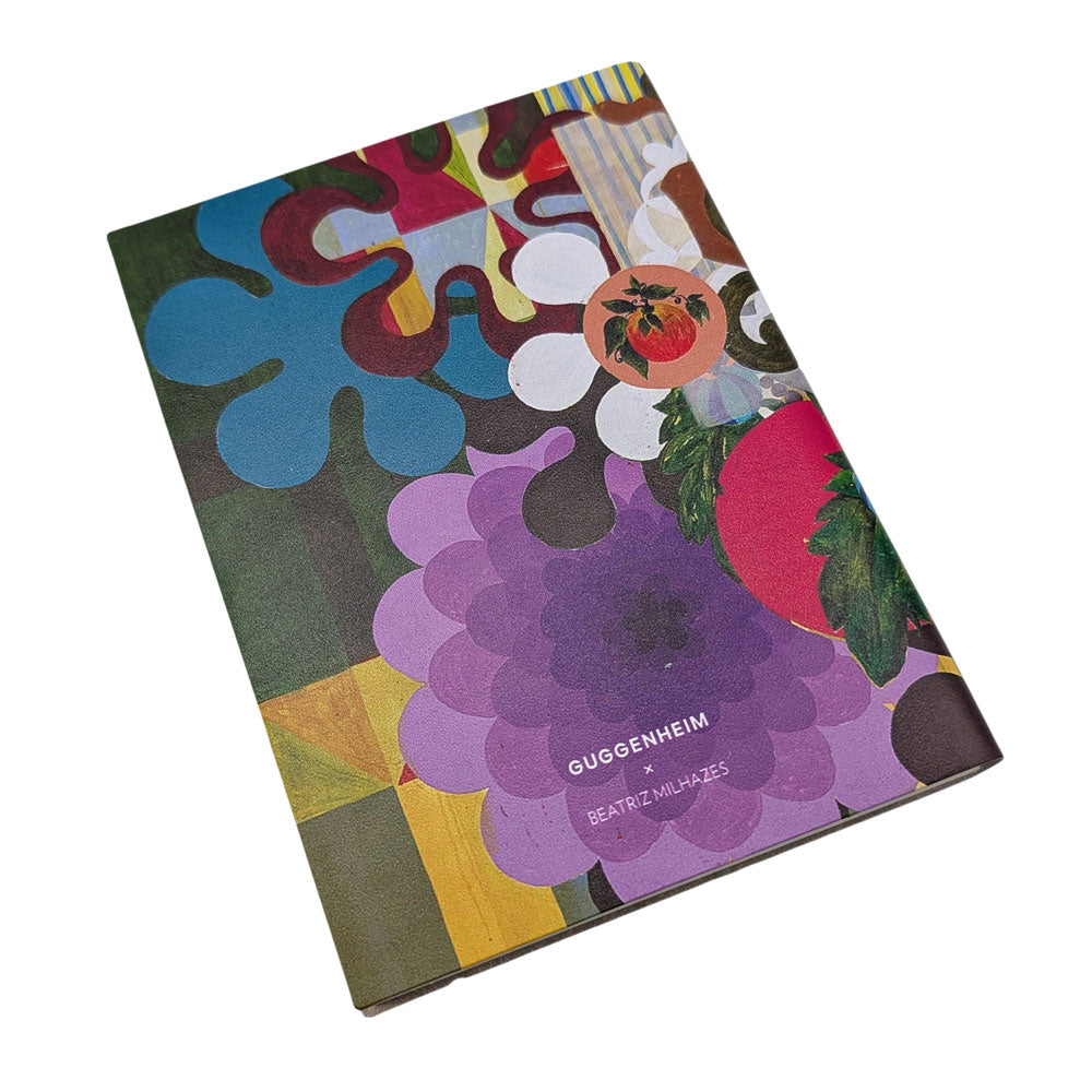 A colorful abstract cover with flower and fruit motifs, styled like the Guggenheim Beatriz Milhazes Leather Journal. Title and author are printed on the front, with the book shown against a white background.