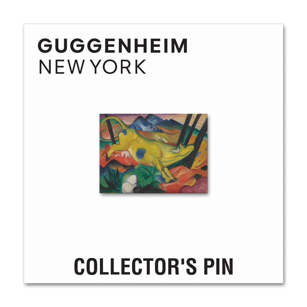 The Franz Marc Yellow Cow Pin is a nickel-plated collector’s pin (1.22" W x 0.92" H) featuring the colorful artwork, mounted on a white card labeled “Guggenheim New York” on top and “Collector’s Pin” at the bottom.