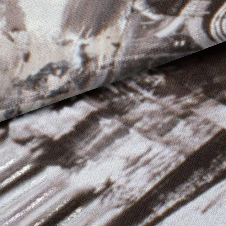 Close-up of Robert Rauschenberg Barge Scarf by Guggenheim Museum, with a textured, art-inspired black and white pattern.