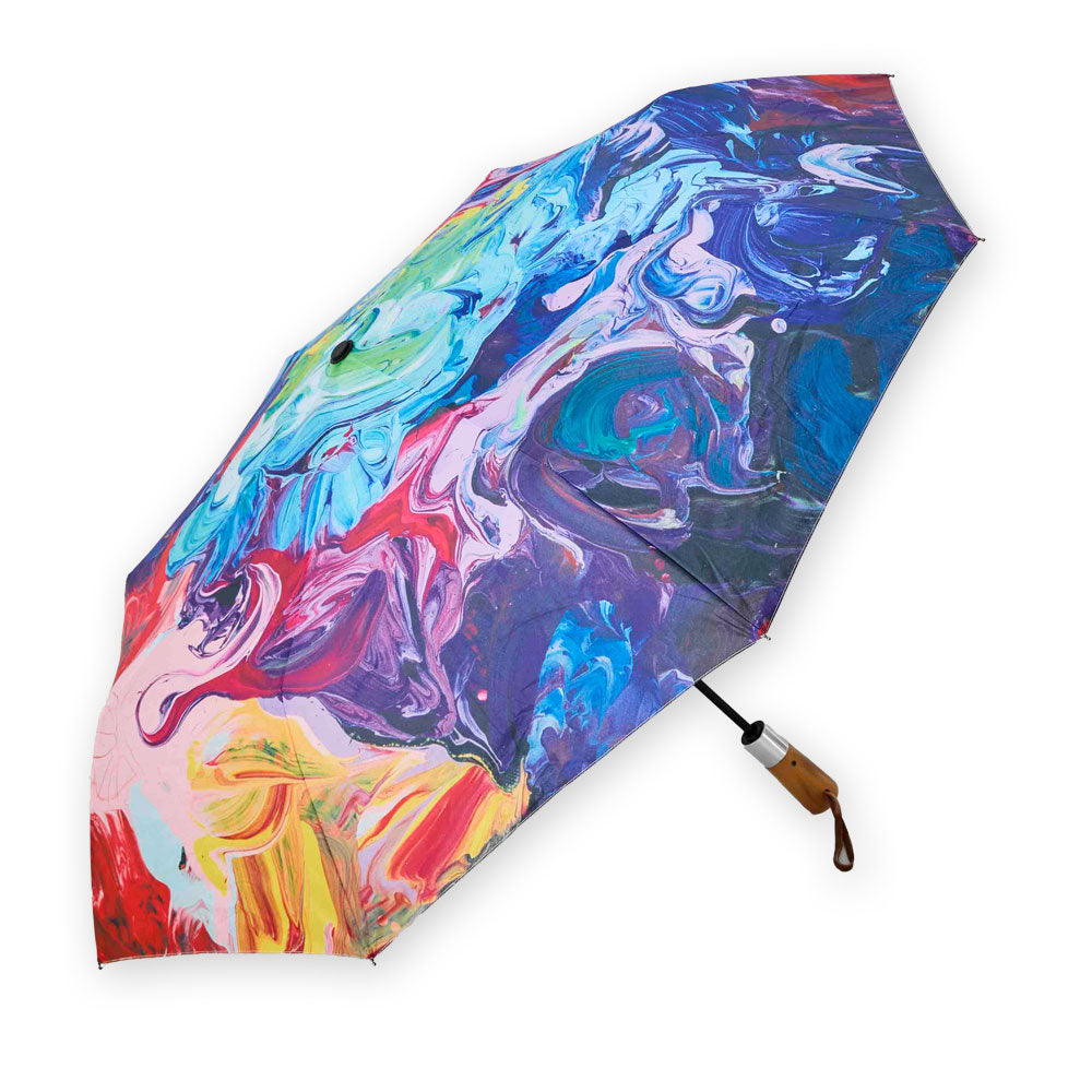 The Painter's Palette Travel Umbrella by Guggenheim Museum features abstract swirls inspired by New York City's energy.