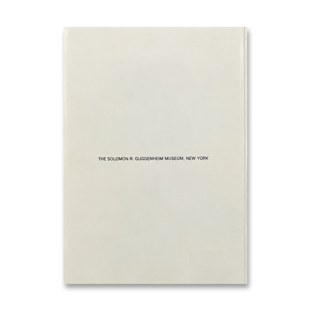 White cover with centered text: Roy Lichtenstein Catalog, Guggenheim Museum. Inspired by Pop Art.