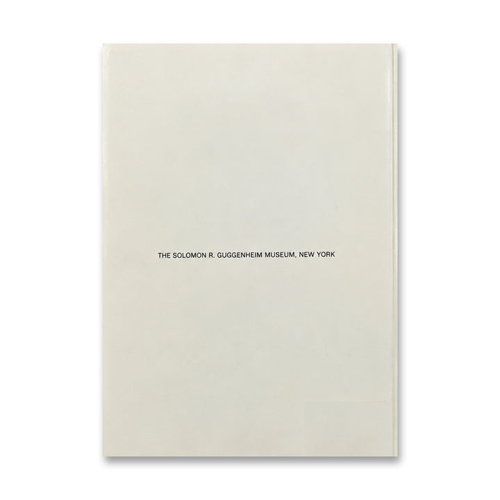 White cover with centered text: Roy Lichtenstein Catalog, Guggenheim Museum. Inspired by Pop Art.