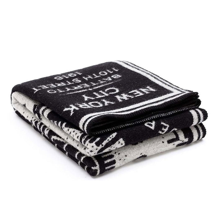 Guggenheim Museum New York City Map Wool Throw—folded black & white, features NYC street names; great unique gift.