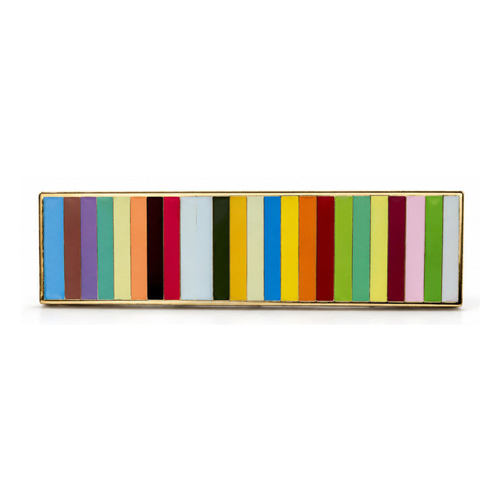 Guggenheim Museum Taryn Simon Striped Pin, a rectangular gold-toned pin featuring a row of multicolored enamel stripes.