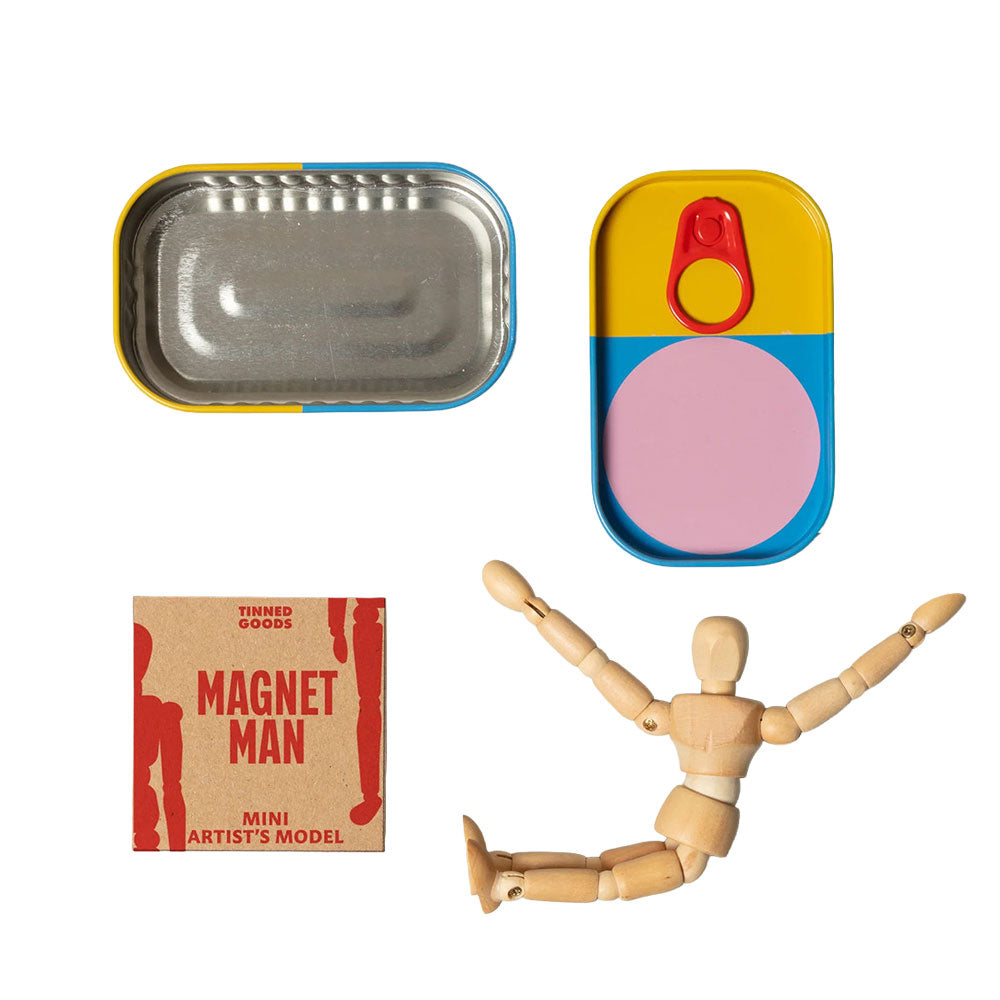 Magnet Man Tinned Goods by Guggenheim Museum—mini wooden mannequin in colorful tin with MAGNET MAN label.