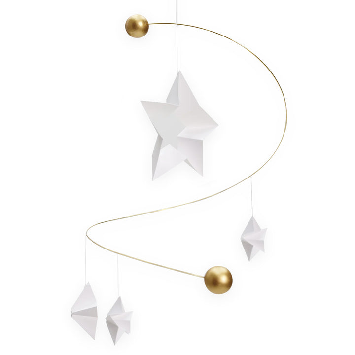 The Guggenheim Museum Starry Night Flensted Mobile features white paper stars and gold spheres on a curved gold wire.