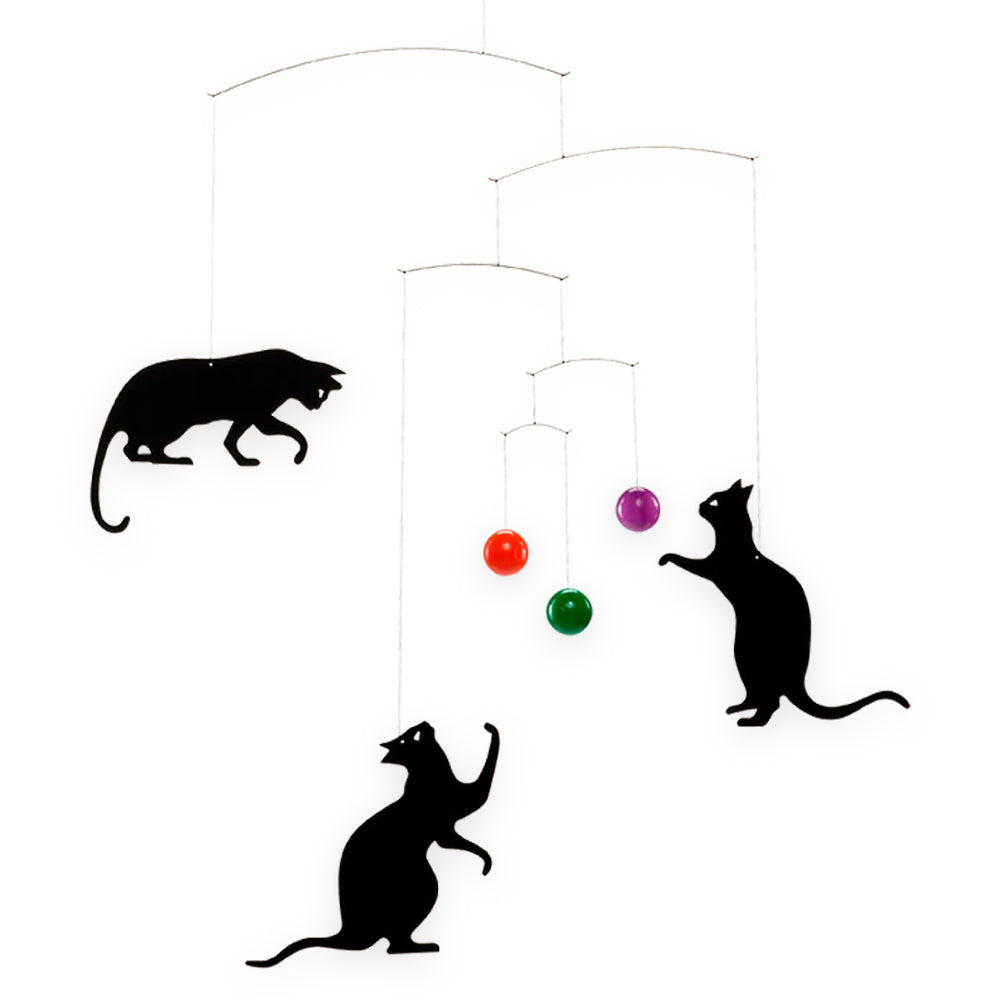 The Guggenheim Museum Feline Fun Hanging Mobile features three black cats and colorful balls in Danish design.