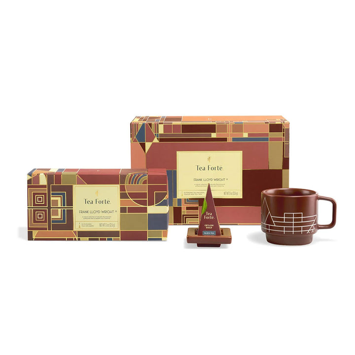 Guggenheim’s Frank Lloyd Wright Tea Forte Set: geometric tea gift with brown mug & pyramid infuser for architecture lovers.