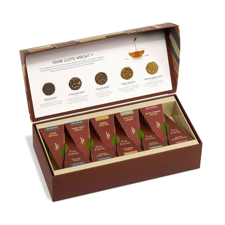 Open brown box showing Guggenheim Museum Frank Lloyd Wright Tea Forte Cafe Tea Gift Set—perfect for tea or architecture fans.