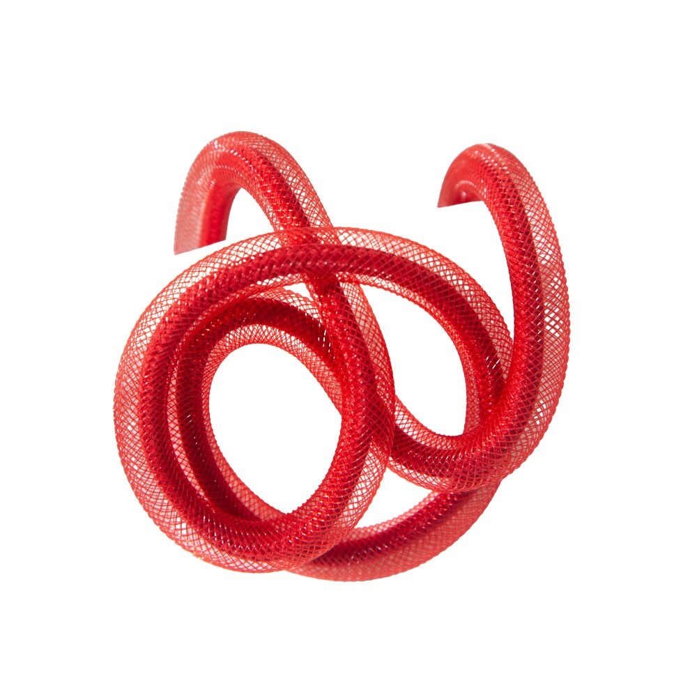 Red mesh hose coiled on a white background