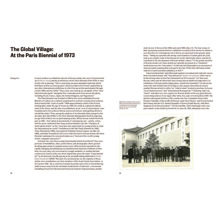 A two-page spread from Only the Young: Experimental Art in Korea, 1960s–1970s, English, titled The Global Village: At the Paris Biennial of 1973 by Kyung An, features text columns and a black-and-white photo of people outside a building.