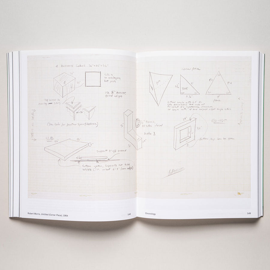 An open copy of "Object Lessons: Case Studies in Minimal Art-The Guggenheim Panza Collection Initiative" lies open, featuring hand-drawn geometric sketches and notes on graph paper that highlight minimalism and conceptual art influences.