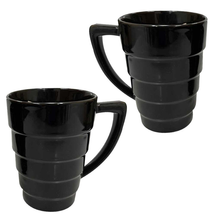 The 1959 Modern Black 12oz Mug Set features two ribbed, tiered mugs with angular handles, displayed side by side on a white background—perfect for adding contemporary elegance to your coffee routine.