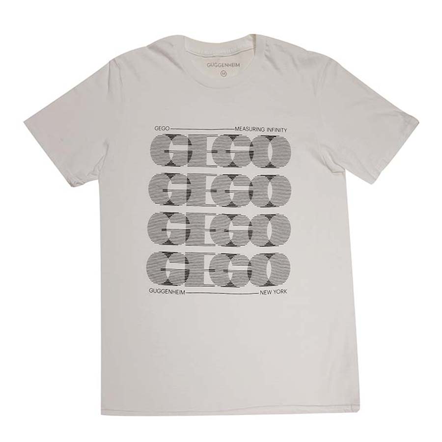 The Gego: Measuring Infinity Logo T-Shirt, Unisex, is a white tee with a black geometric GECO print. Text above and below reads "Gego Measuring Infinity," "Guggenheim Museum," and "NEW YORK.
