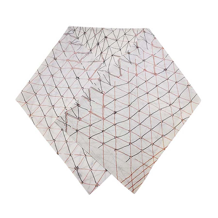 The Gego Scarf, Cotton Oblong features a geometric grid of black and red lines with scattered small dots, folded to highlight its modern design—reminiscent of styles from the Measuring Infinity exhibition.