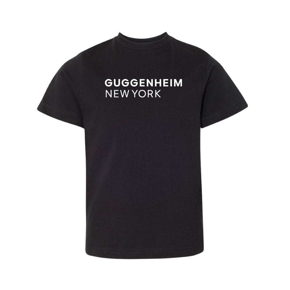 The Guggenheim New York Youth T-Shirt is a black, unisex kids’ tee featuring bold white uppercase lettering on the front—a stylish tribute to iconic youth art shirt designs.