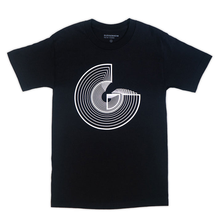 The Guggenheim Icon T-Shirt in black is a unisex cotton tee featuring a bold white geometric design with concentric arcs, inspired by modern art and iconic Guggenheim architecture.