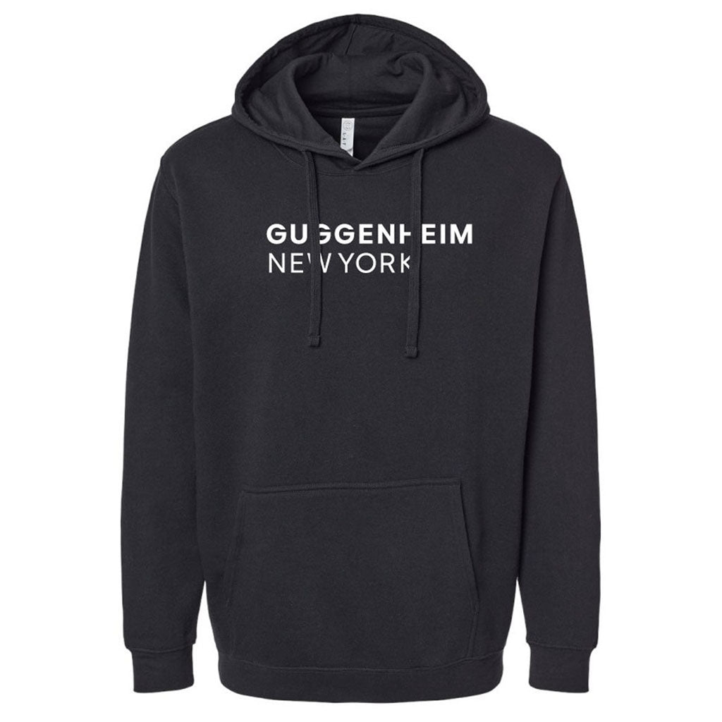 The Guggenheim New York Hooded Sweatshirt is a black pullover with a front pocket and bold white "Guggenheim New York" lettering—ideal museum apparel for art enthusiasts.