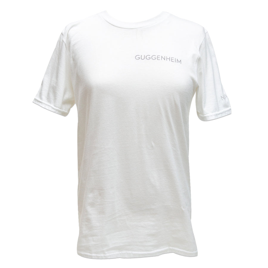 The Guggenheim Rotunda Tee is a unisex white cotton shirt with the Guggenheim Logo in small, light gray print on the upper left chest, shown against a white background.