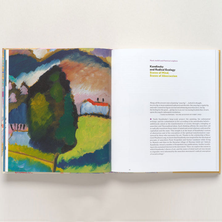 An open book, Vasily Kandinsky: Around the Circle, shows a colorful abstract landscape on the left page and text titled Kandinsky and Radical Ecology: States of Mind, Success of Abstraction on the right, highlighting his role in European modernism.
