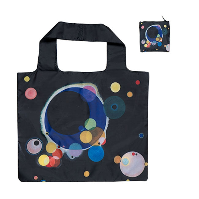 The Kandinsky Tote Bag, Several Circles, is a reusable black grocery bag featuring vibrant circle and bubble patterns. A compact folding tote version is shown in the upper right corner.